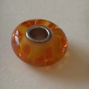 Trollbeads Murano "Red Flower" glass bead with sterling silver core stamped 925